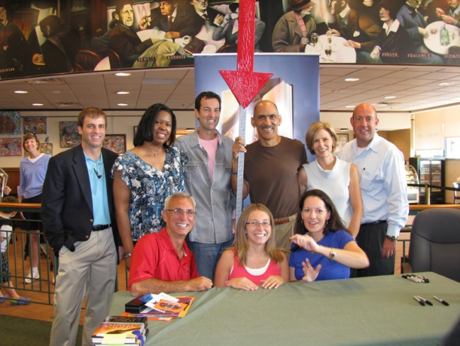 tony-dungy-and-nathan-whitaker-with-tyndale-team-and-friends-at-the-end-of-barnes-and-noble-book-signing-in-carmel-in
