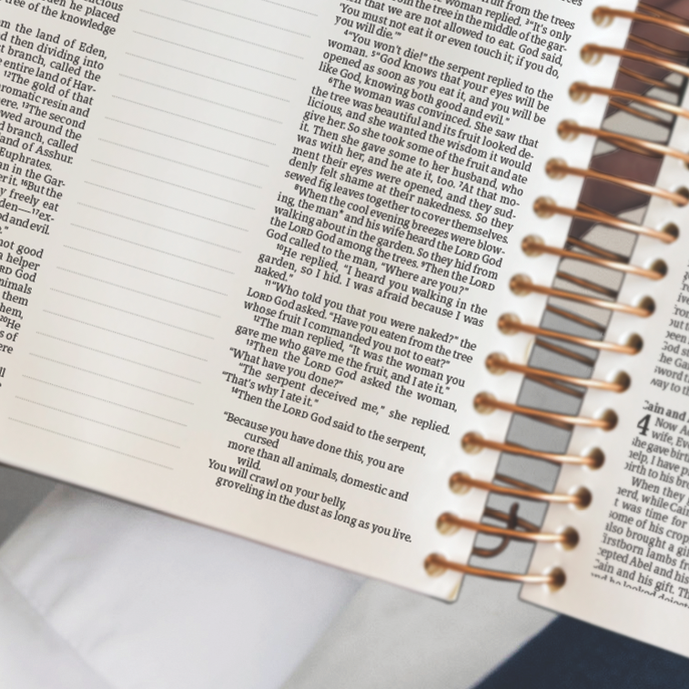 Close-up of the spiral binding on an open Notetaking Bible