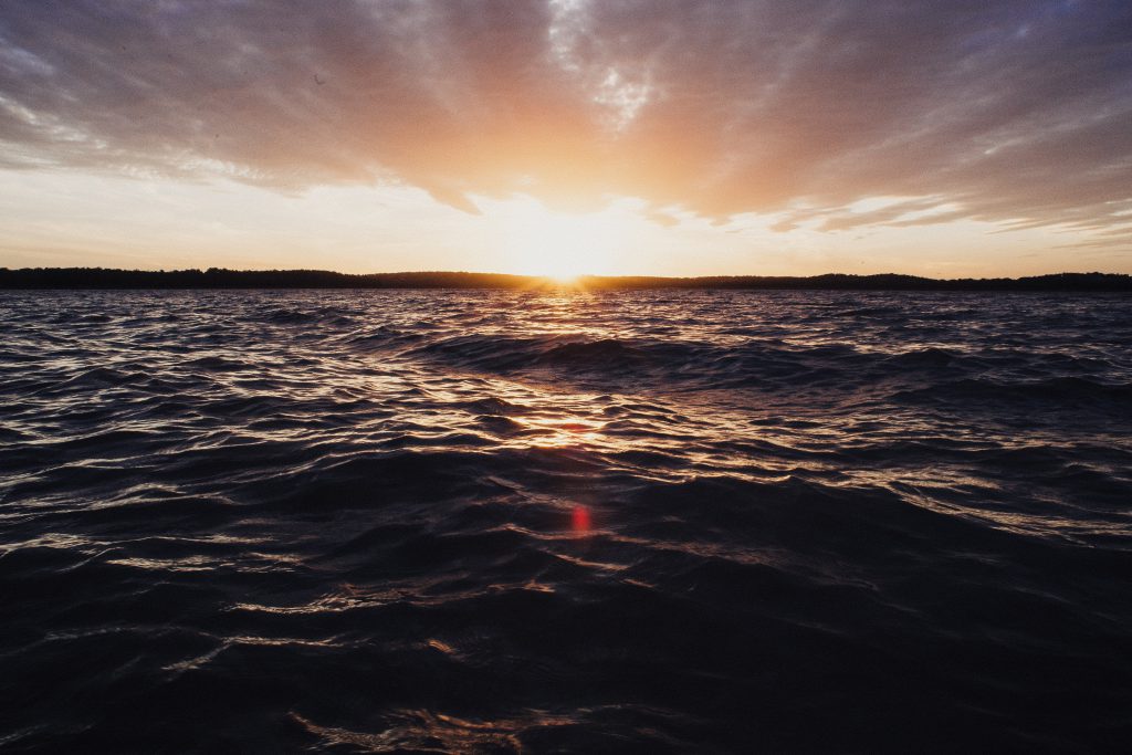 God will forgive any sin but this one. a bright sun shines over a dark ocean as it comes up for the morning. God will forgive any sin but this one. a bright sun shines over a dark ocean as it comes up for the morning.