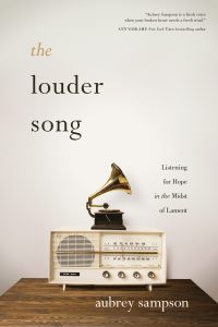 The front cover of Aubrey's book, The Louder Song, a powerful exploration of lament, and how God's healing is always the 'louder song' than our own pain. The front cover of Aubrey's book, The Louder Song, a powerful exploration of lament, and how God's healing is always the 'louder song' than our own pain.